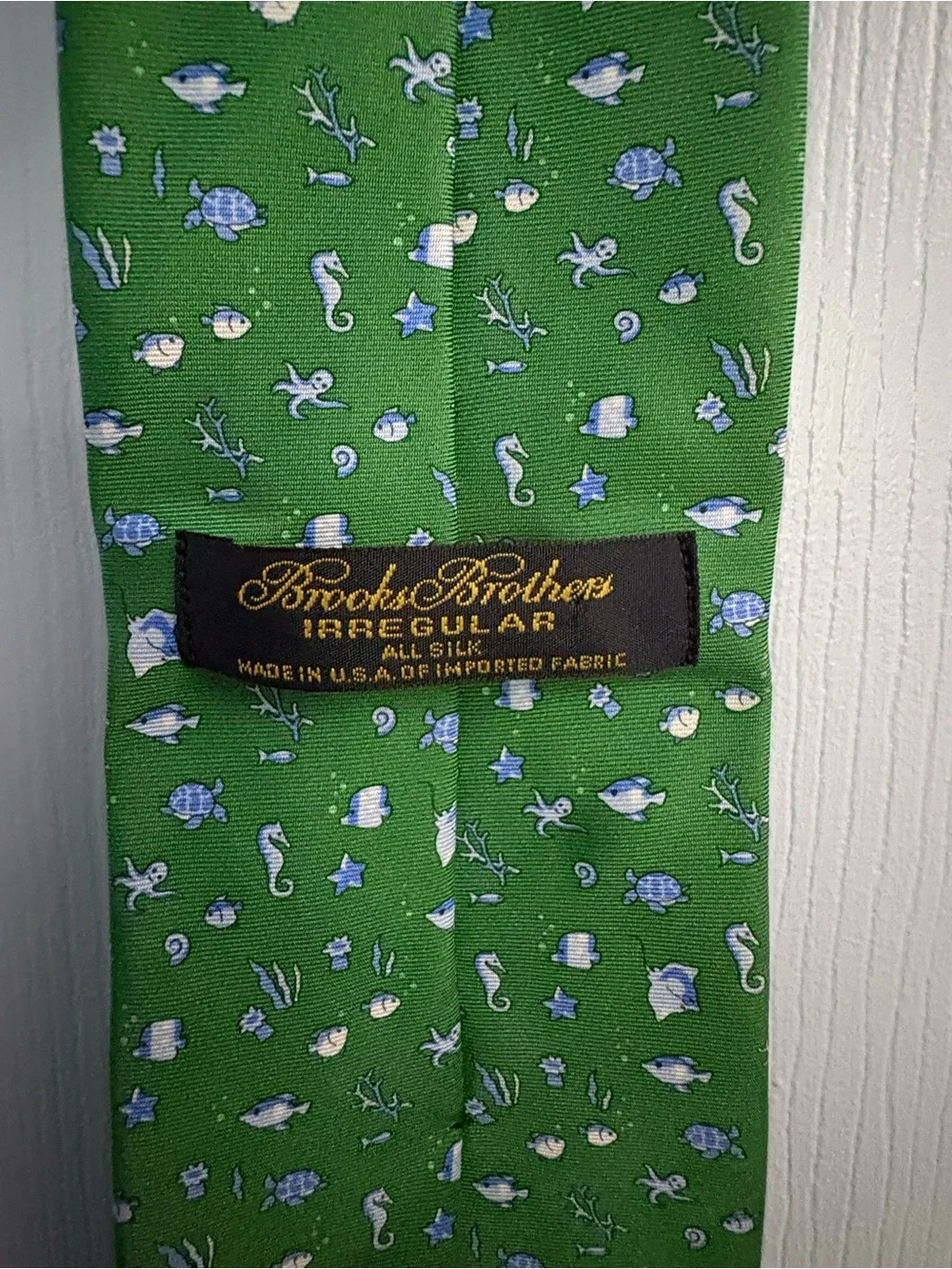 Vineyard Vines Green Tie with Blue and White Nautical Motifs